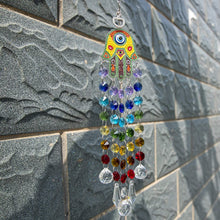 Load image into Gallery viewer, Hamsa Hand Hanging Crystal Suncatcher Ornament with Chakra Energy Beads and Clear Crystal Ball Prisms Rainbow Maker Pendant
